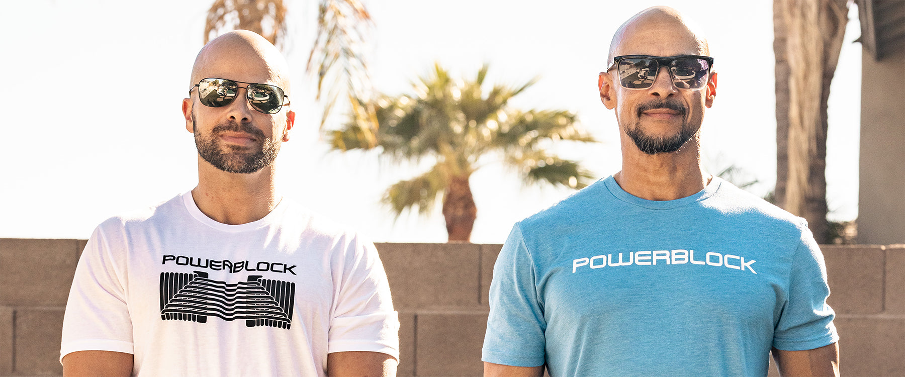 two male athletes wearing PowerBlock adjustable dumbbell tee shirts