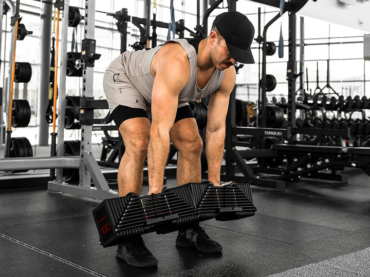 Dead lift using the PowerBlock Commercial Pro 100 Adjustable Dumbbells.