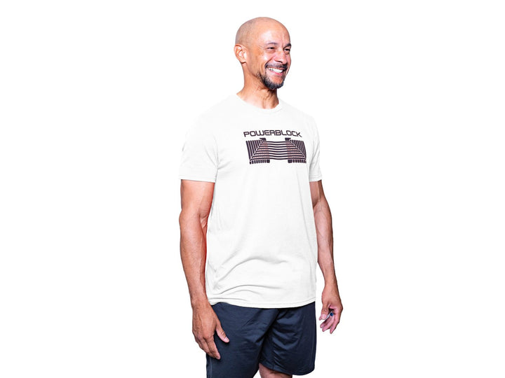 Man wearing a White Mens Tee that features a black PowerBlock Dumbbell.