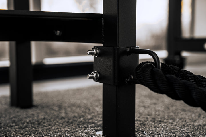 Close up of the PowerBlock Battle rope attachment being used on a PowerBlock stand