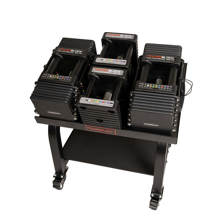 PowerBlock Commercial Pro 125 adjustable dumbbells with knurled grips on a Pro Max stand.  Shown with a pair of 12.5 and 20lb handles.