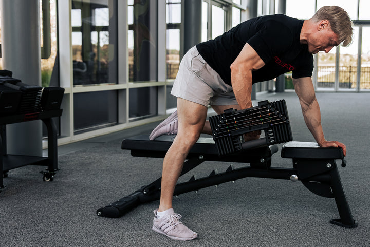 Single arm row using a Commercial Pro 125 Adjustable Dumbbell.