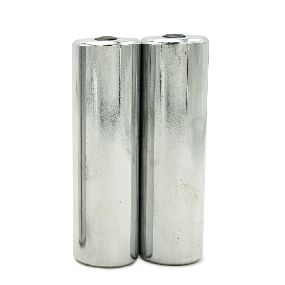 A pair of PowerBlock chrome micro weights for use with Elite USA model to increase weight in small increments.