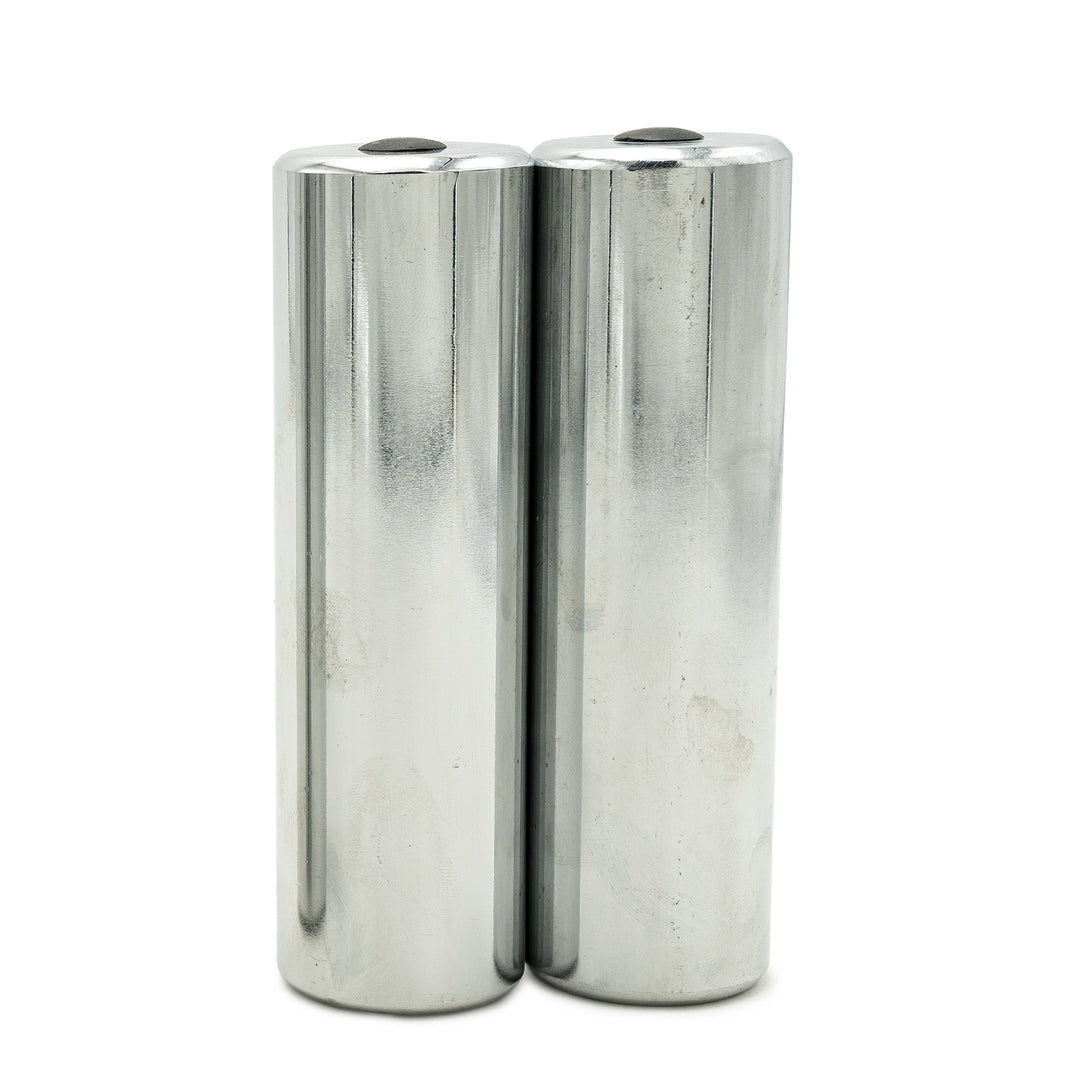 A pair of PowerBlock chrome micro weights for use with Elite USA model to increase weight in small increments.