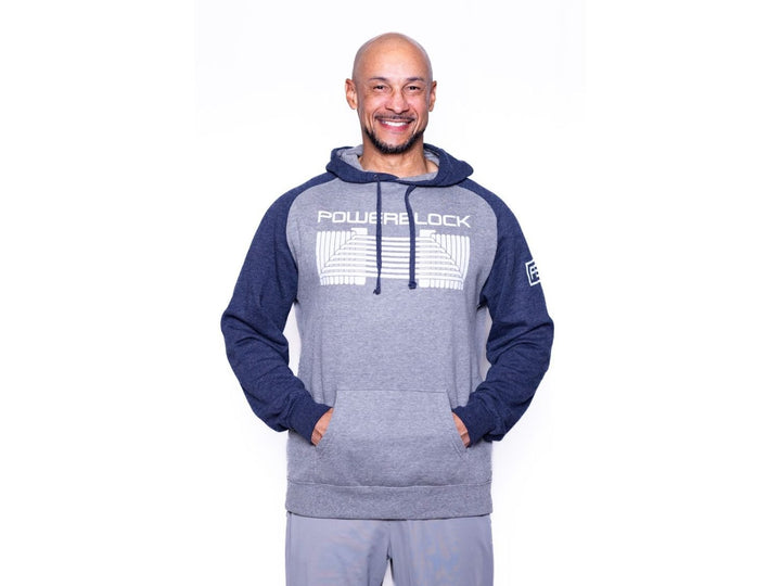 Front view of man in PowerBlock Navy Classic Hoodie.