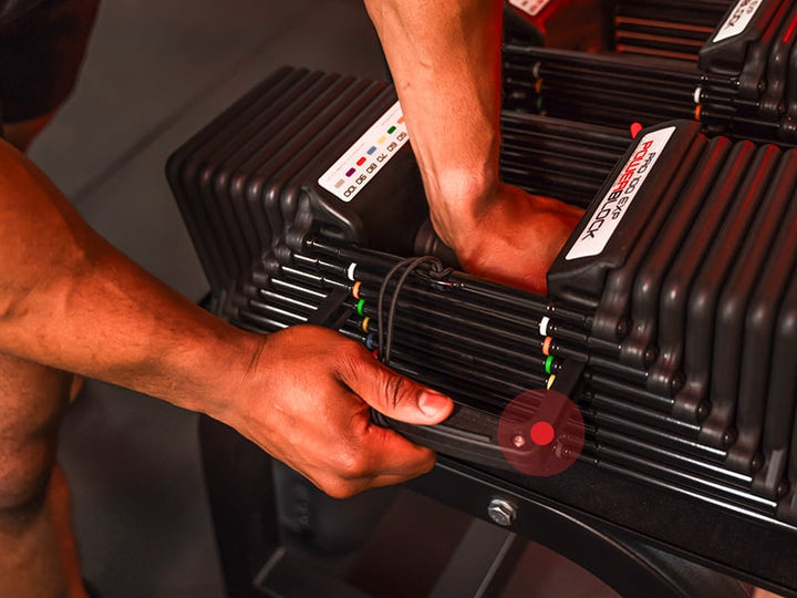 PowerBlock Pro 100 pin selection showing how adjustable dumbbells work.