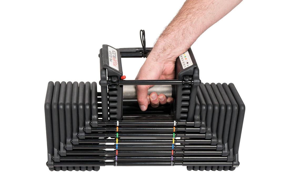 PowerBlock knurled grip handle being removed from the 100lb adjustable dumbbell weight stack, detailed view of medium knurling on a 38mm handle