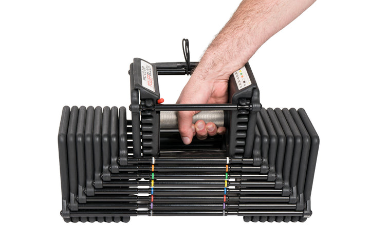 PowerBlock knurled grip handle being removed from the 100lb adjustable dumbbell weight stack, detailed view of medium knurling on a 38mm handle