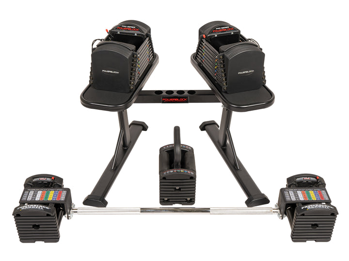 PowerBlock Pro 50 full kit adjustable dumbbell bundle, with stand, kettlebell handle, and straight barbell. 