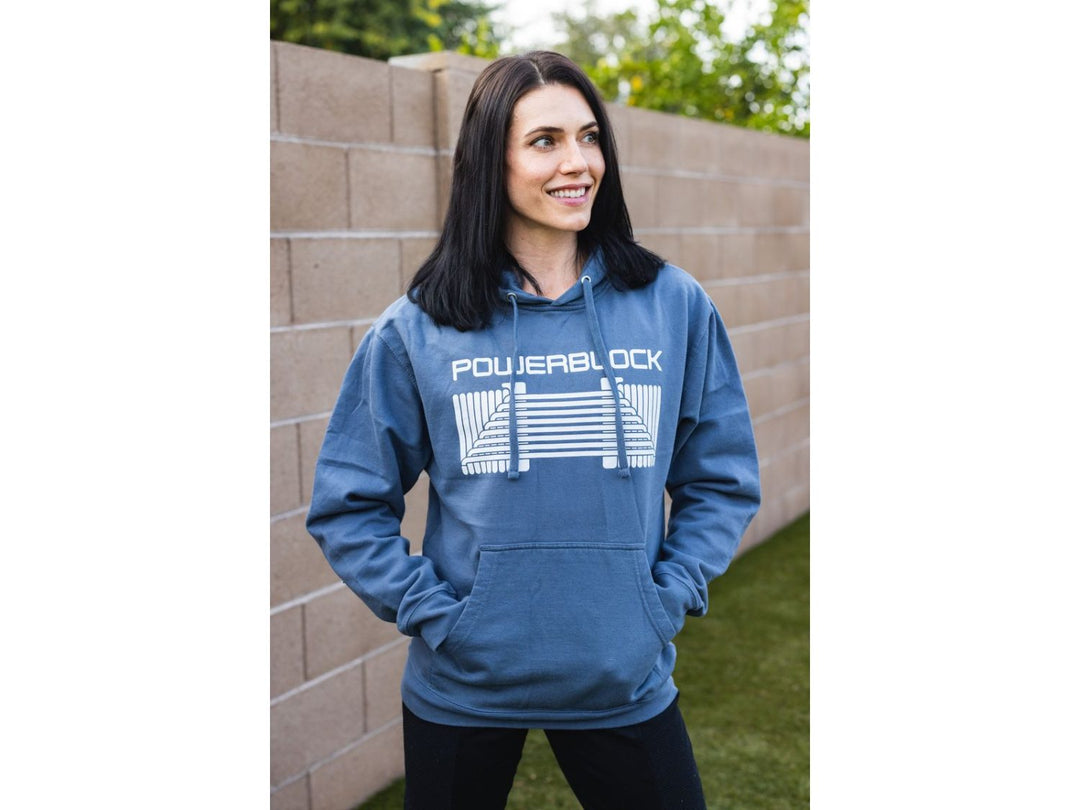 Woman outside wearing a Blue PowerBlock Mid Hoodie.