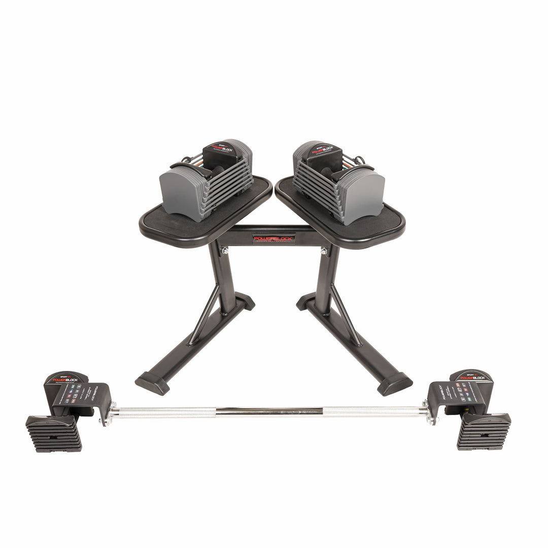 PowerBlock Sport 24 adjustable dumbbells on a powerstand 2.0 with a sport 24 barbell below. The complete adjustable dumbbell and barbell bundle is shown in a small compact footprint
