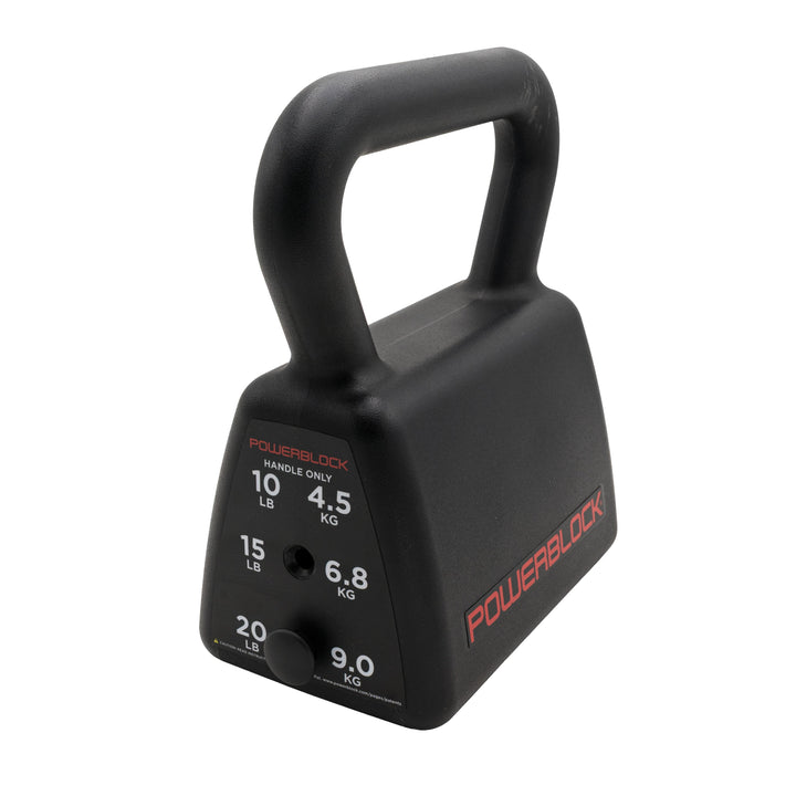A black PowerBlock Sport Kettlebell with printed weight markings in pounds and kilograms. A magnetic selector pin is shown in the 20 lb weight selection.