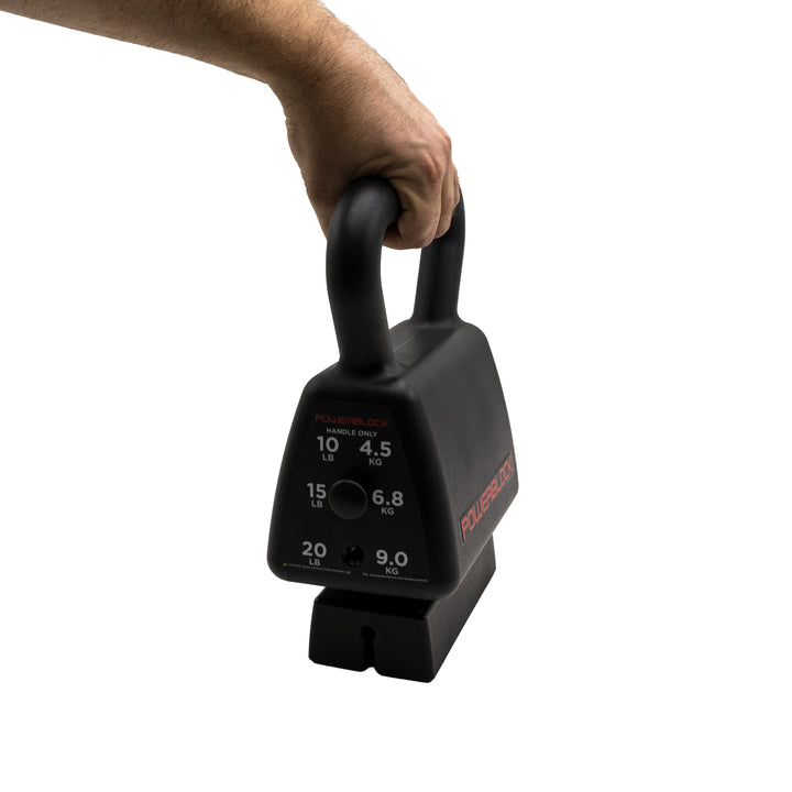 Black kettlebell handle being raised off the weight stack with one hand and pin in place